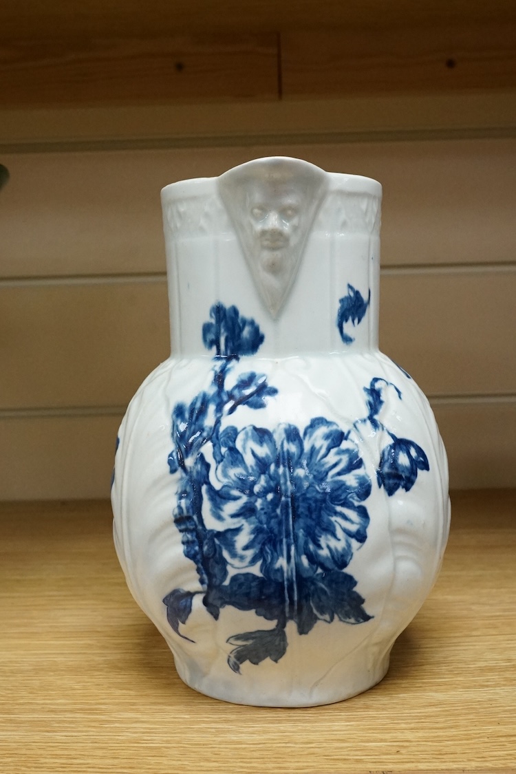 A Caughley blue and white transfer printed mask jug, c. 1780, 21cm high